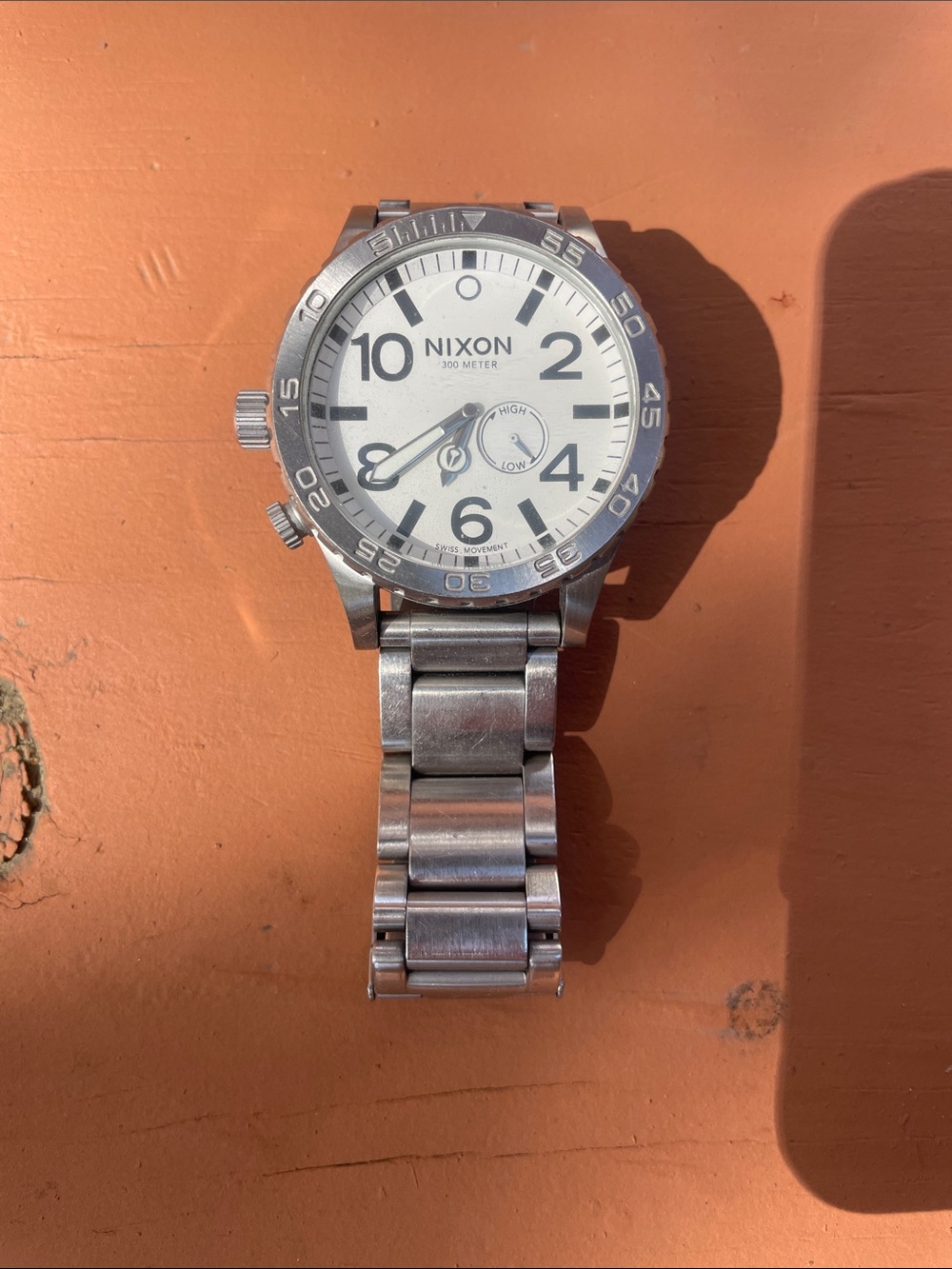 Nixon Silver Stainless Steel Watch with White Dial